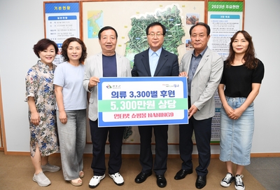 쇼핑몰난닝구이웃돕기후원물품전달식(2).JPG